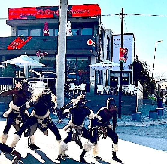 Zulu dancers on street corner, Soweto © Elsa Dixon