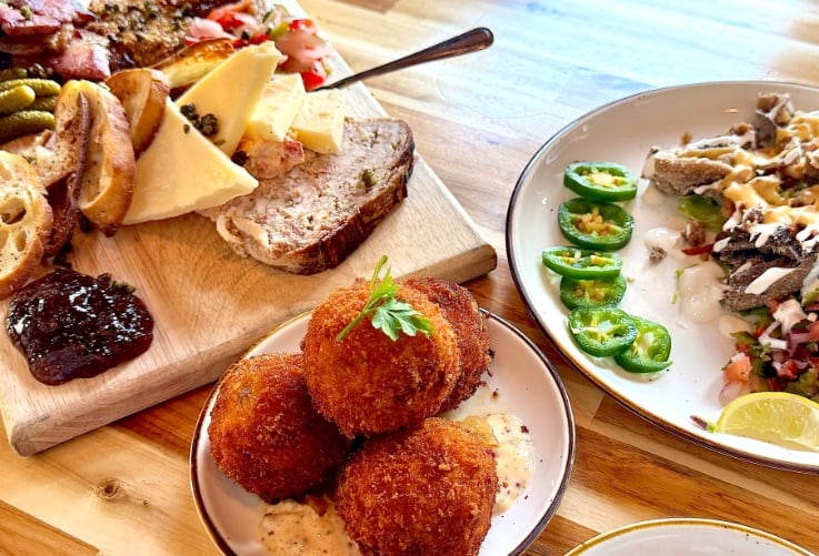 Tusk & Trotter Charcuterie Board and Arkansas Fritter © Scott Kendall