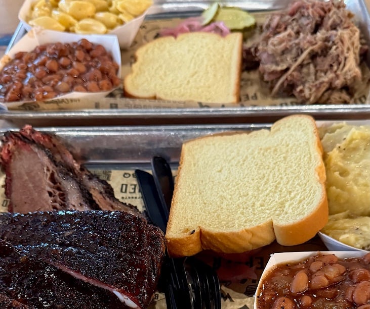Wright's Barbecue brisket, ribs, pulled pork, macaroni and cheese, and smoked beans © Scott Kendall