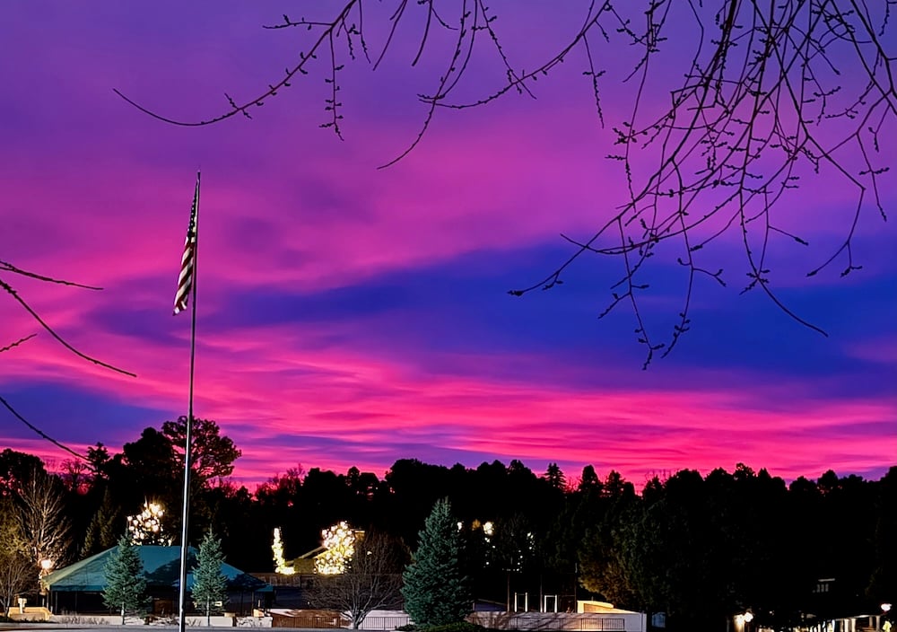 Brilliant red sunrise on New Year's morning at The Broadmoor © Scott Kendall 