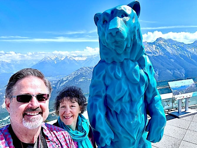 Gondola summit – Scott and Julie with blue grizzly bear © Scott Kendall