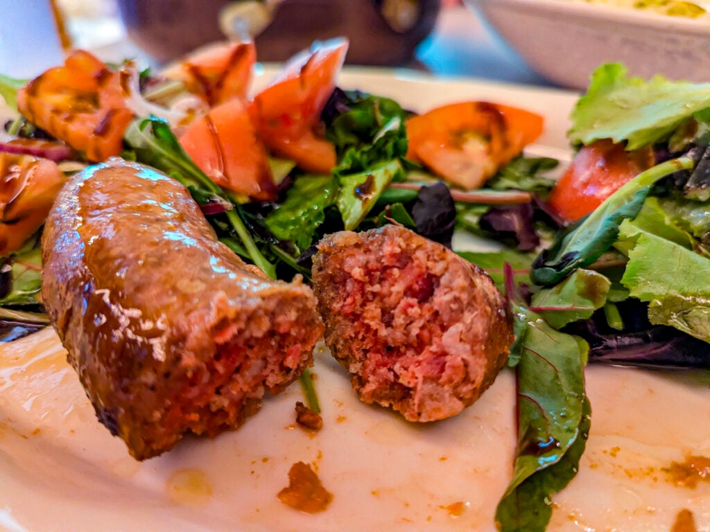 Sausage and a green salad were perfect for lunch at Casa Gaia, Old Town Vlorë © Mary Charlebois