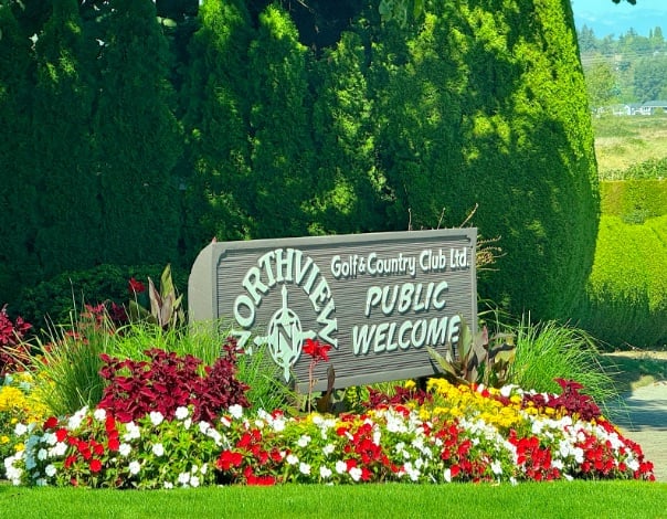 Northview entrance with colorful flowers © Scott Kendall